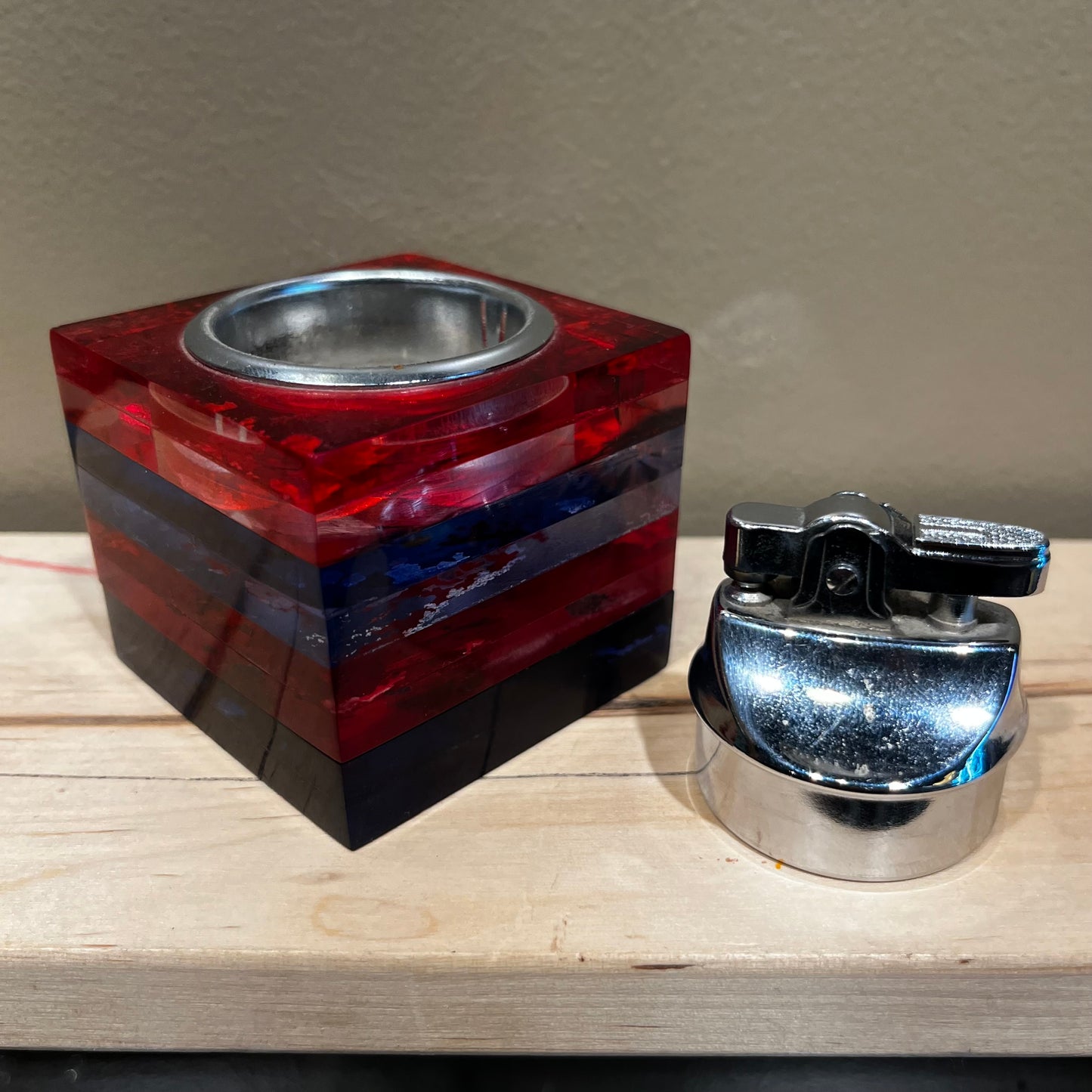 Vintage resin cube lighter.