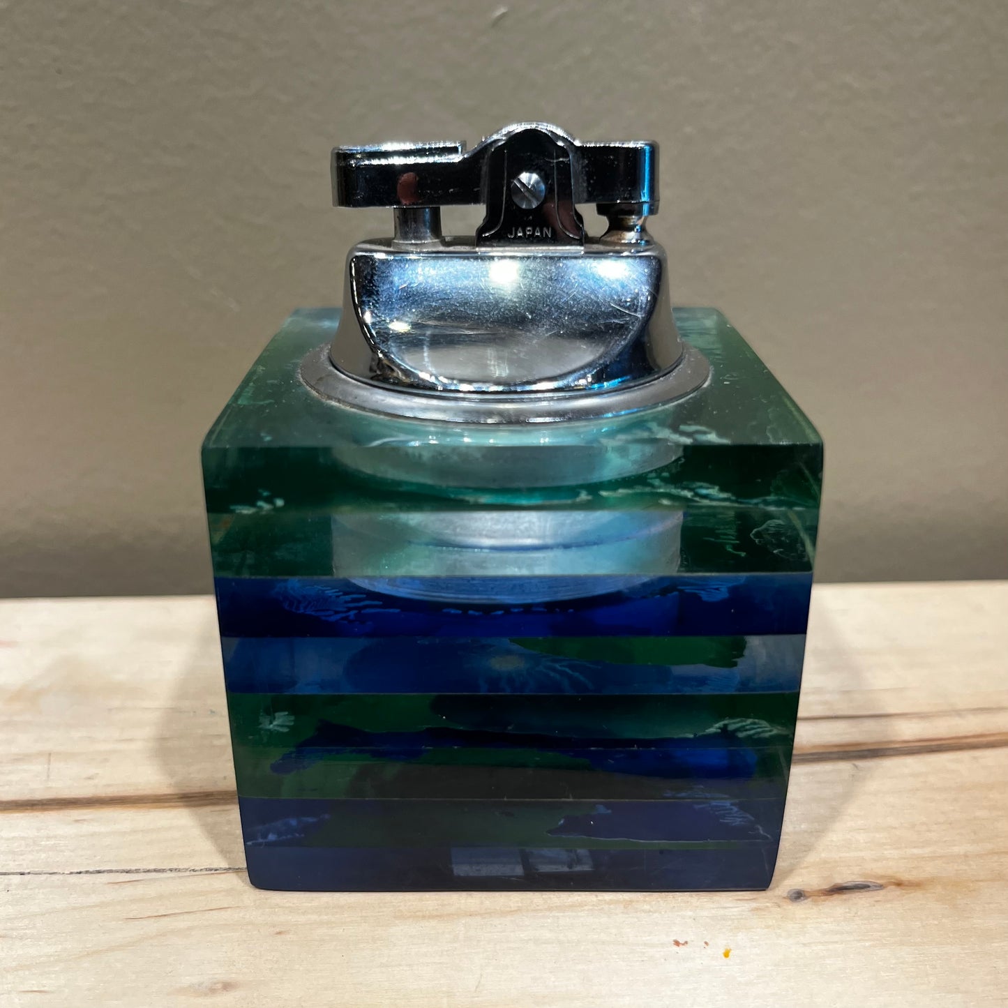 Vintage resin cube lighter.