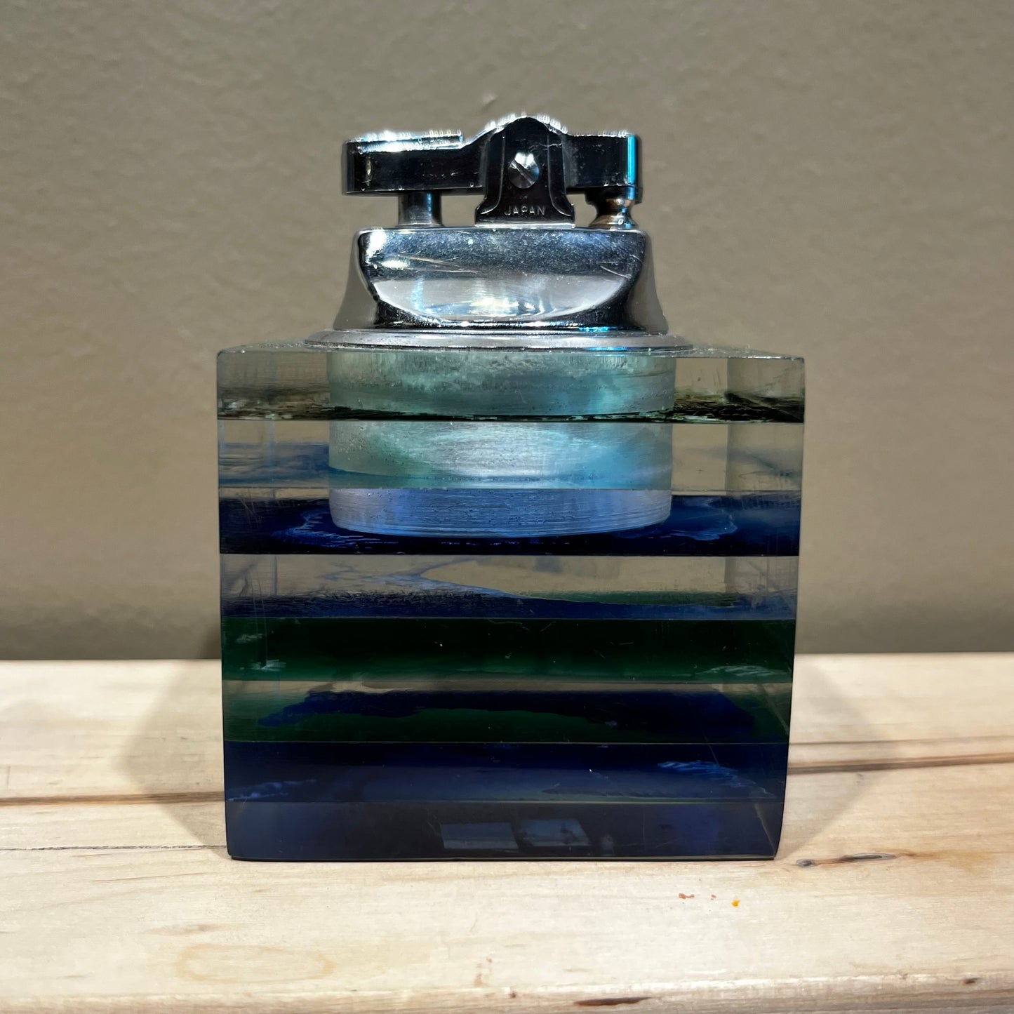 Vintage resin cube lighter.
