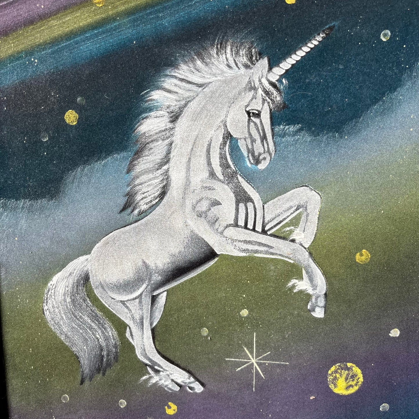 1970s Space unicorn on black velvet.