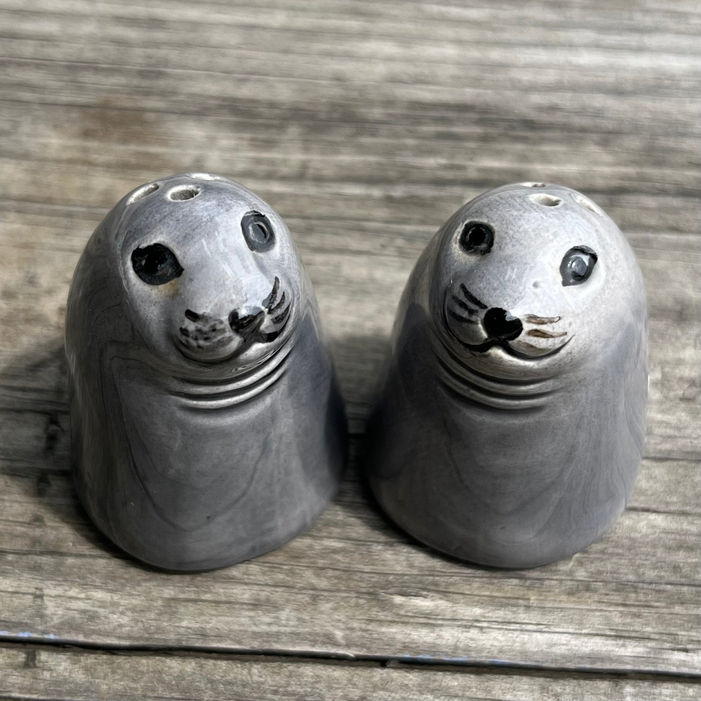 Vintage seal salt n’ pepper shakers.