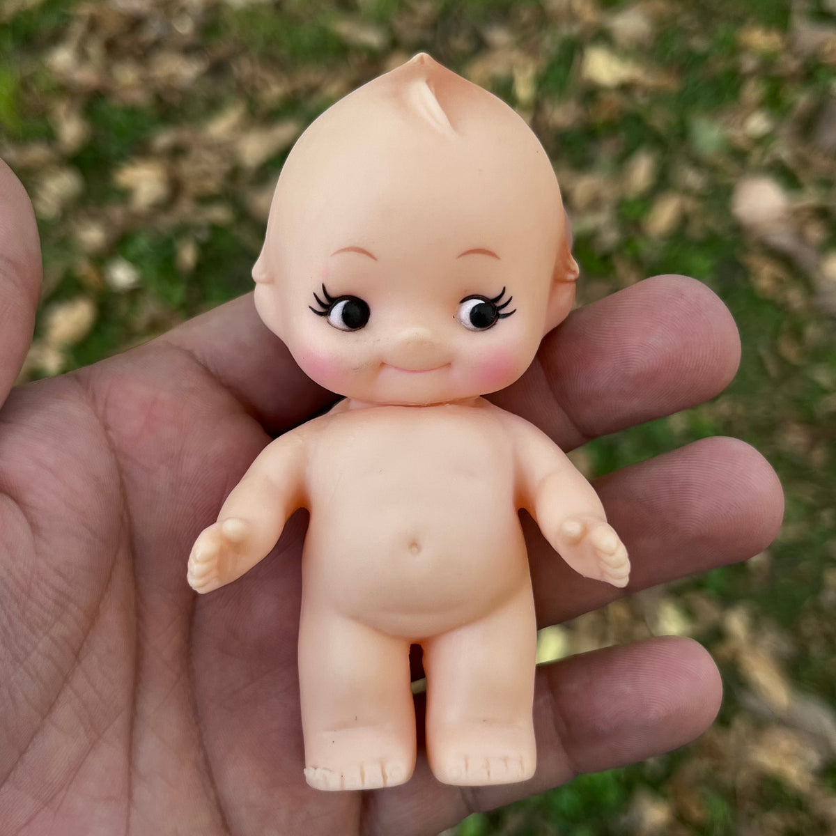 Vintage vinyl Kewpie.