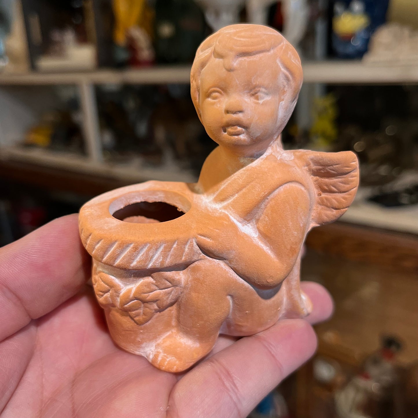 1998 Clay Cherub candle holder set.