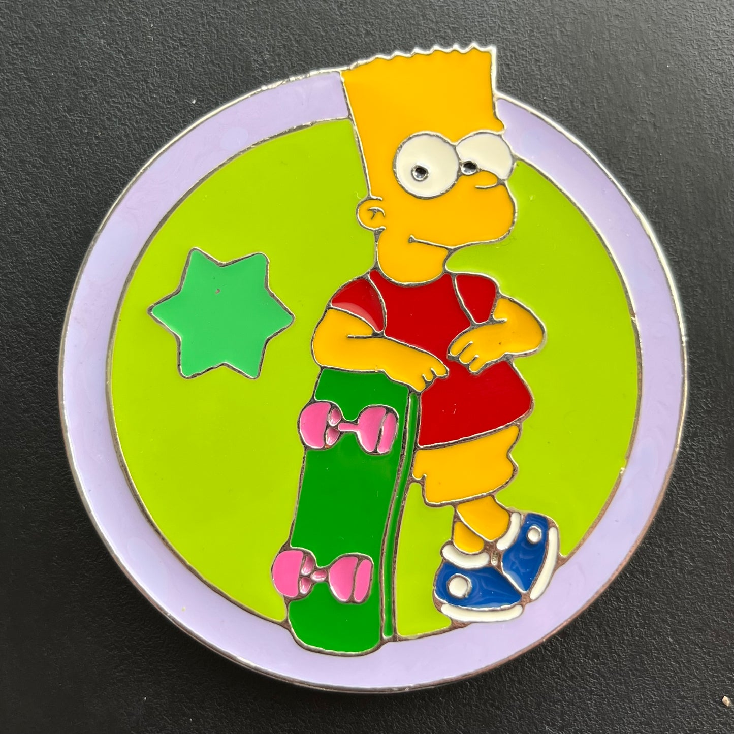 Y2K Bart Simpson belt buckle.