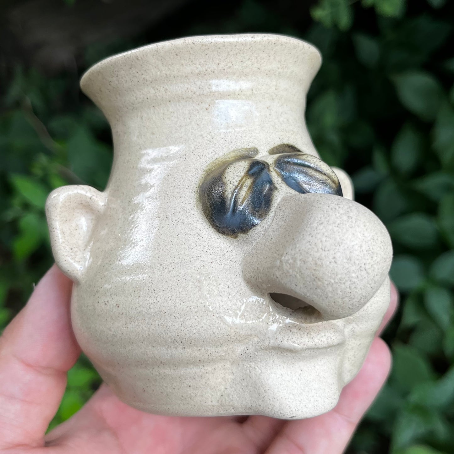 Vintage Peter Petrie stoneware egg seperator.