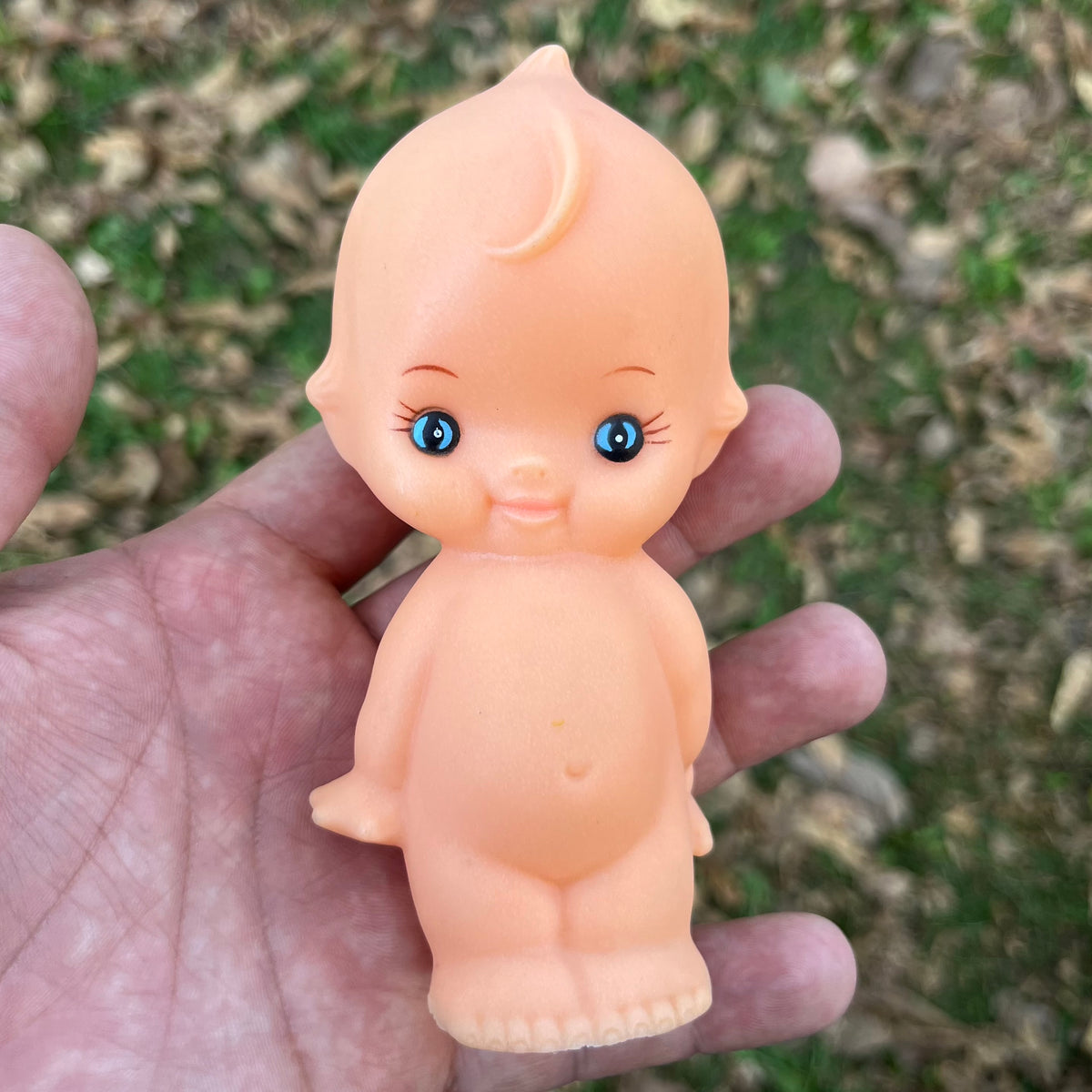 Vintage vinyl Kewpie.