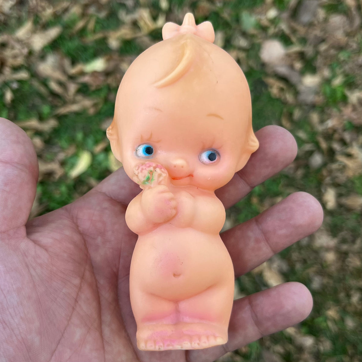 Vintage vinyl Kewpie.