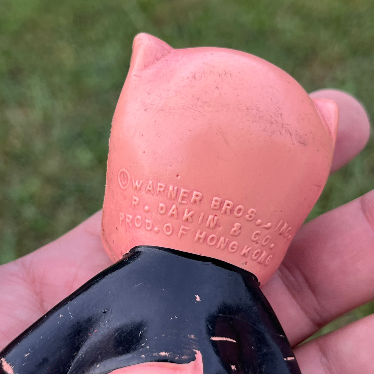 Vintage celluloid Porky the pig toy.