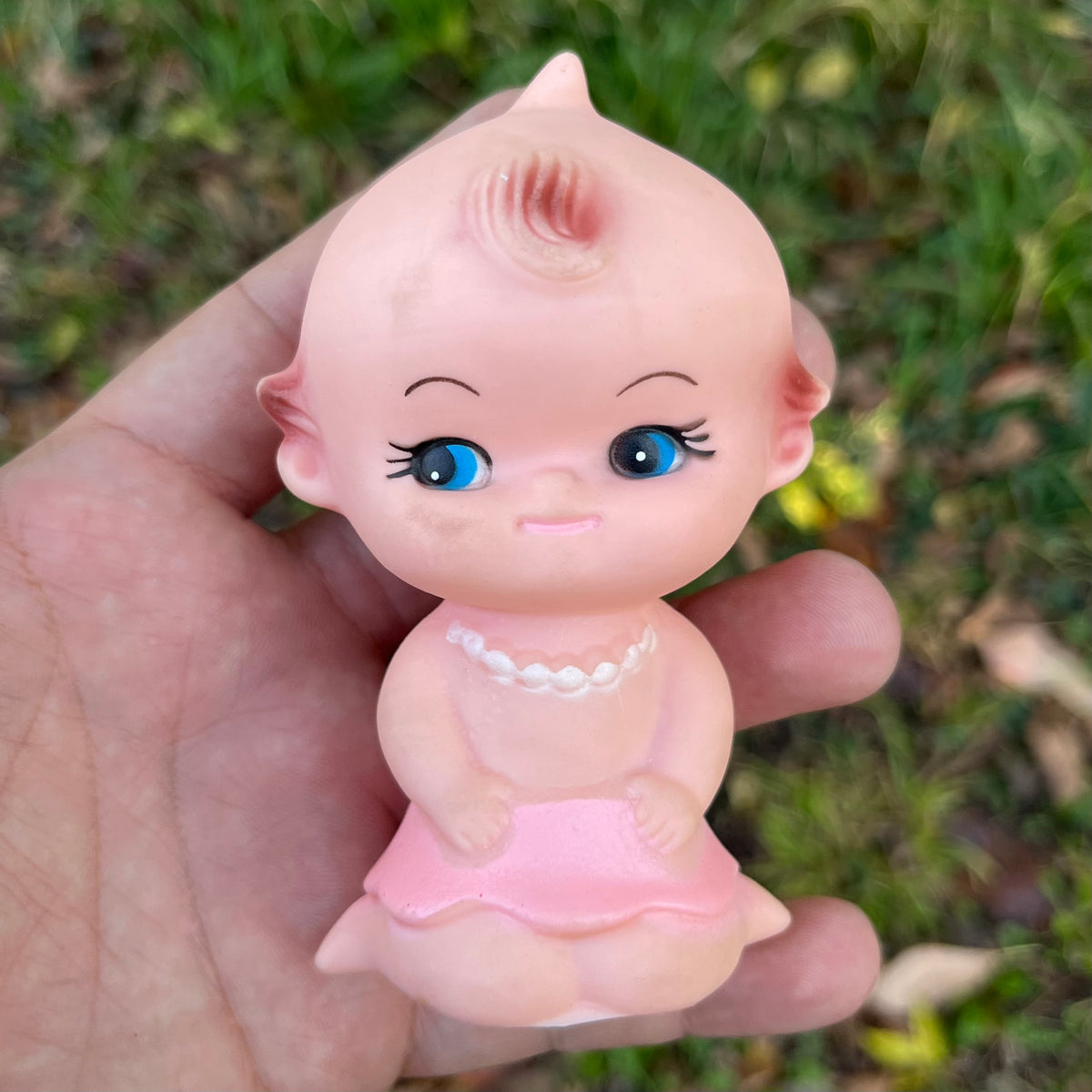 Vintage vinyl Kewpie.