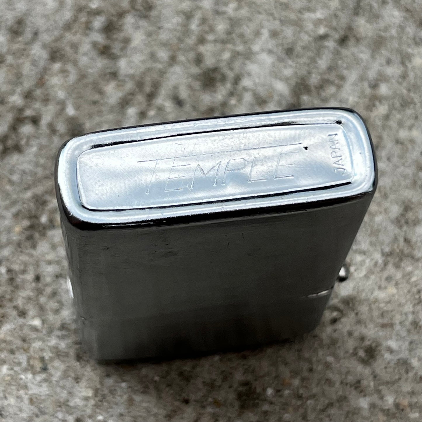 Vintage Temple flip lighter.