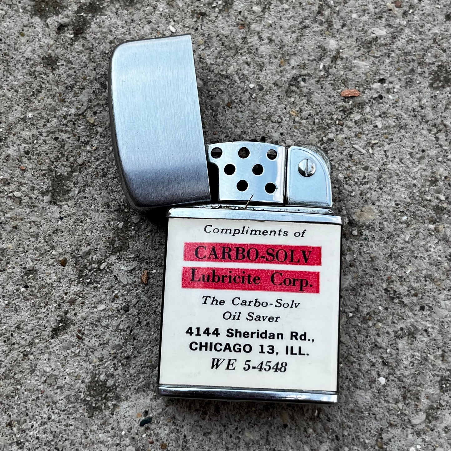 Vintage Lubricite flip lighter.