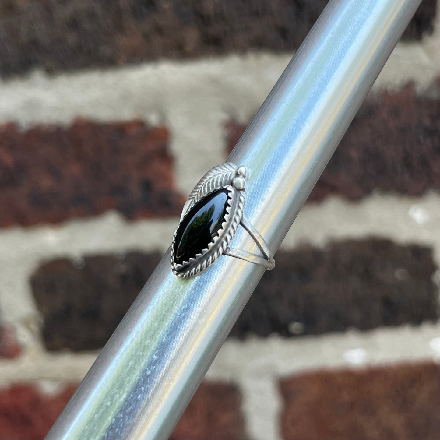 Vintage Sterling silver onyx feather ring. Size 5.25.