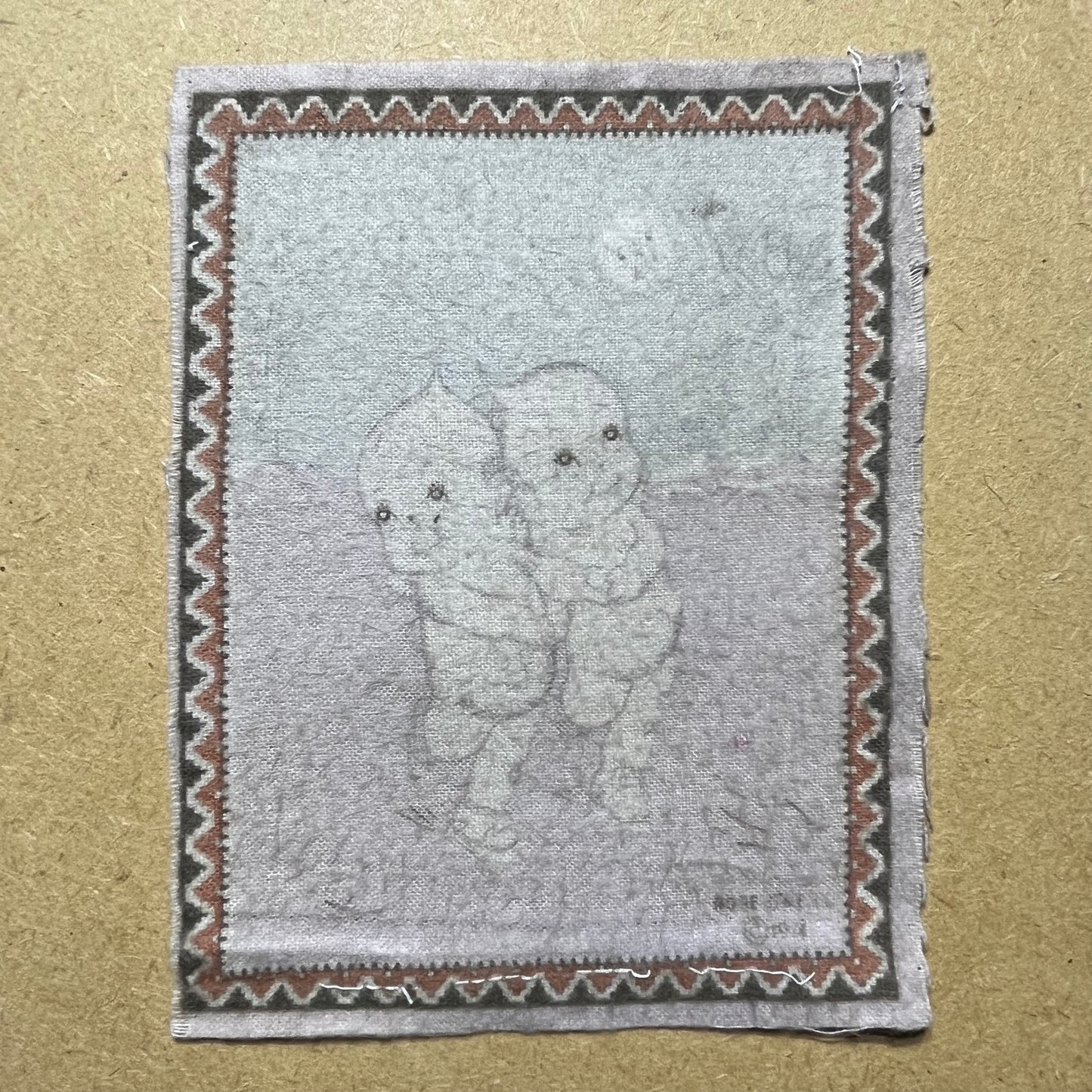 1914 Kewpie felt cloth. (Faded)