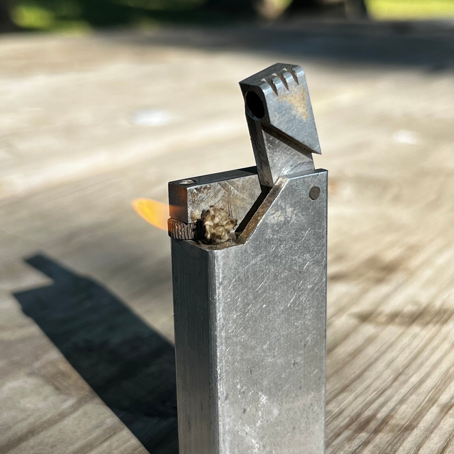 1940s Alluminum brick trench art lighter.