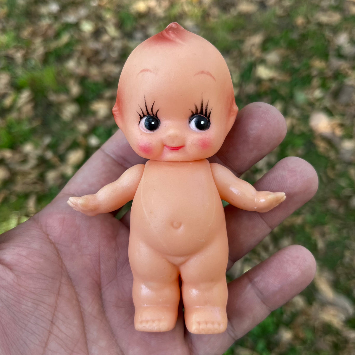 Vintage vinyl Kewpie.
