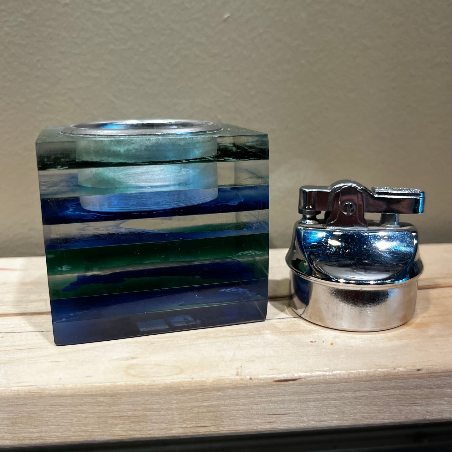 Vintage resin cube lighter.