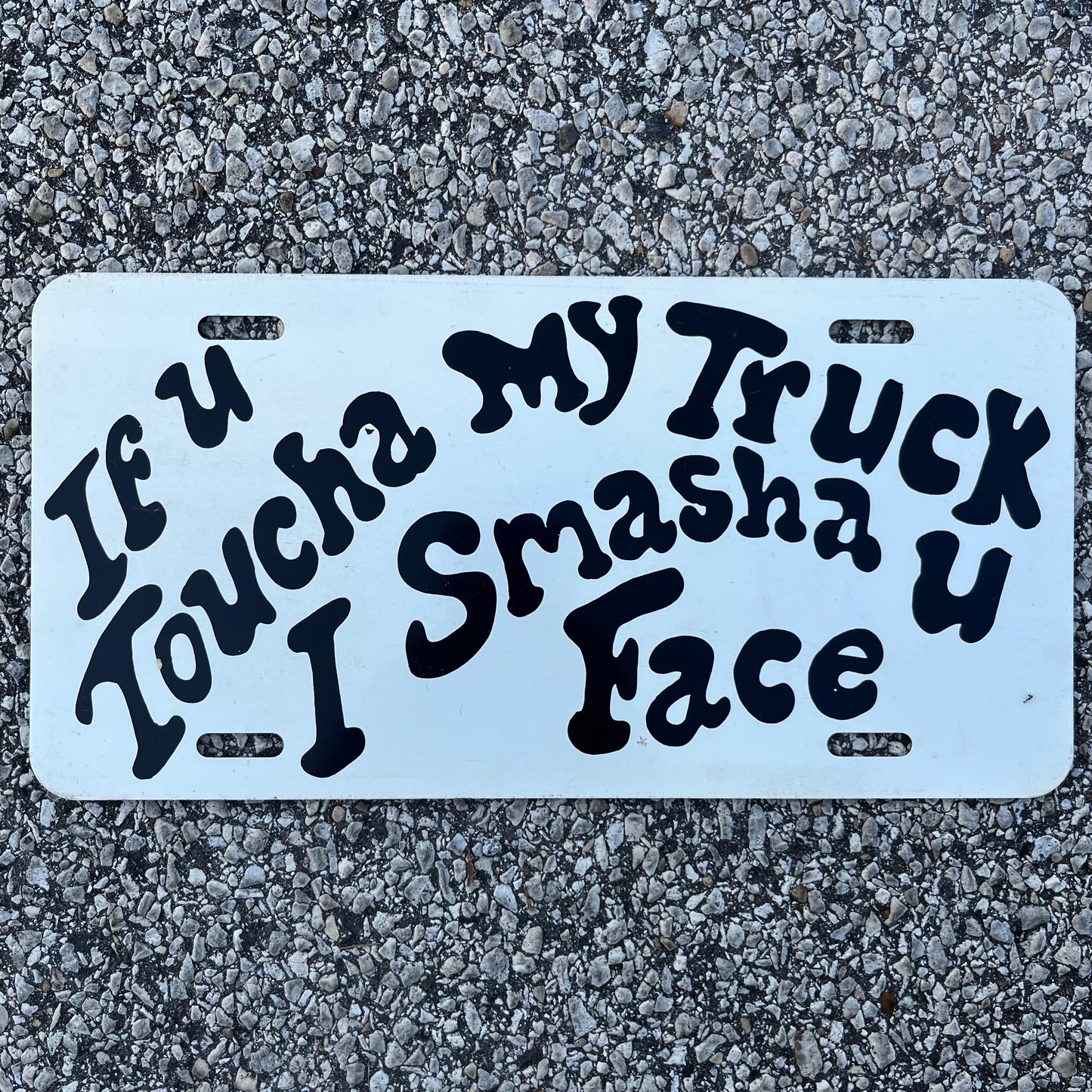 Vintage novelty license plate.