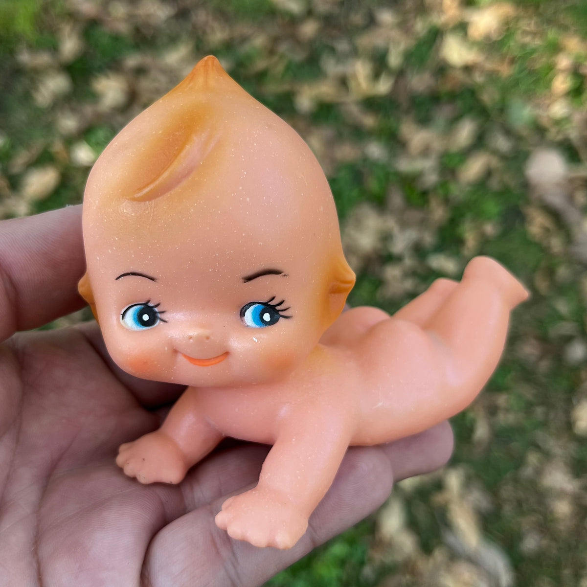 Vintage vinyl Kewpie.