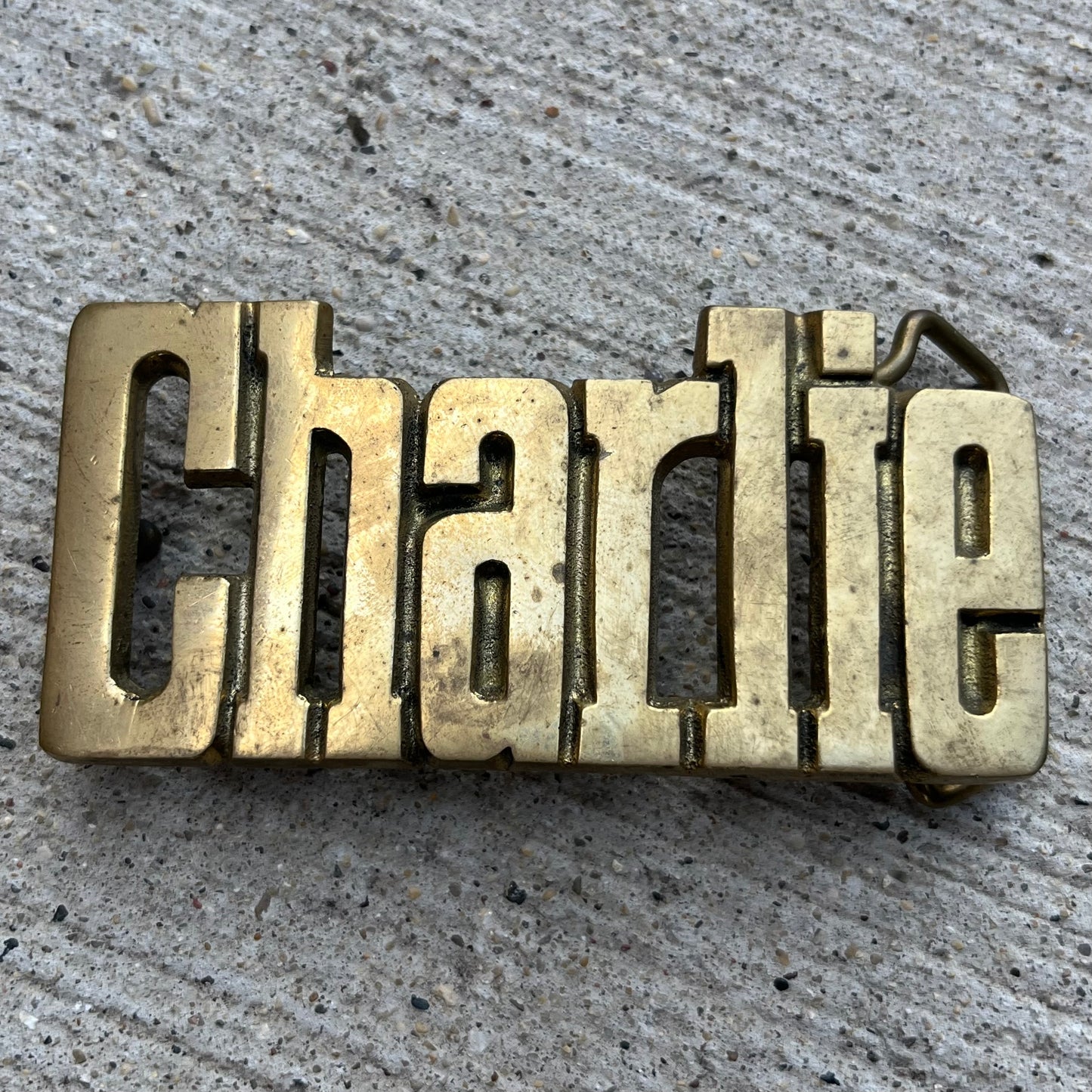 1982 Brass “Charlie” belt buckle.