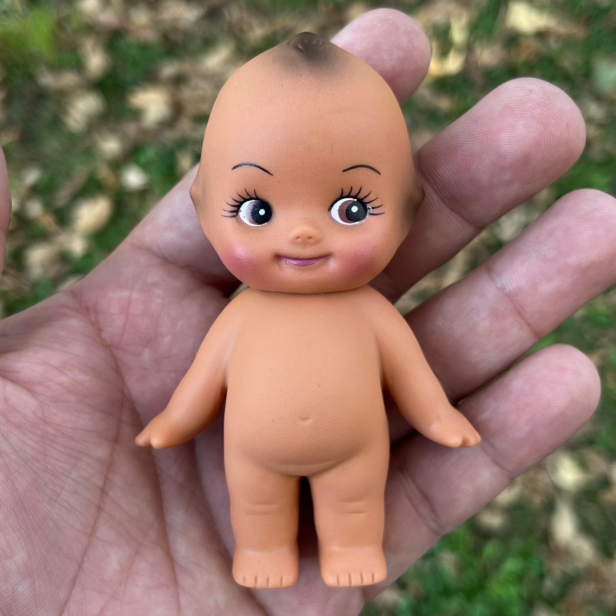 Vintage vinyl Kewpie.