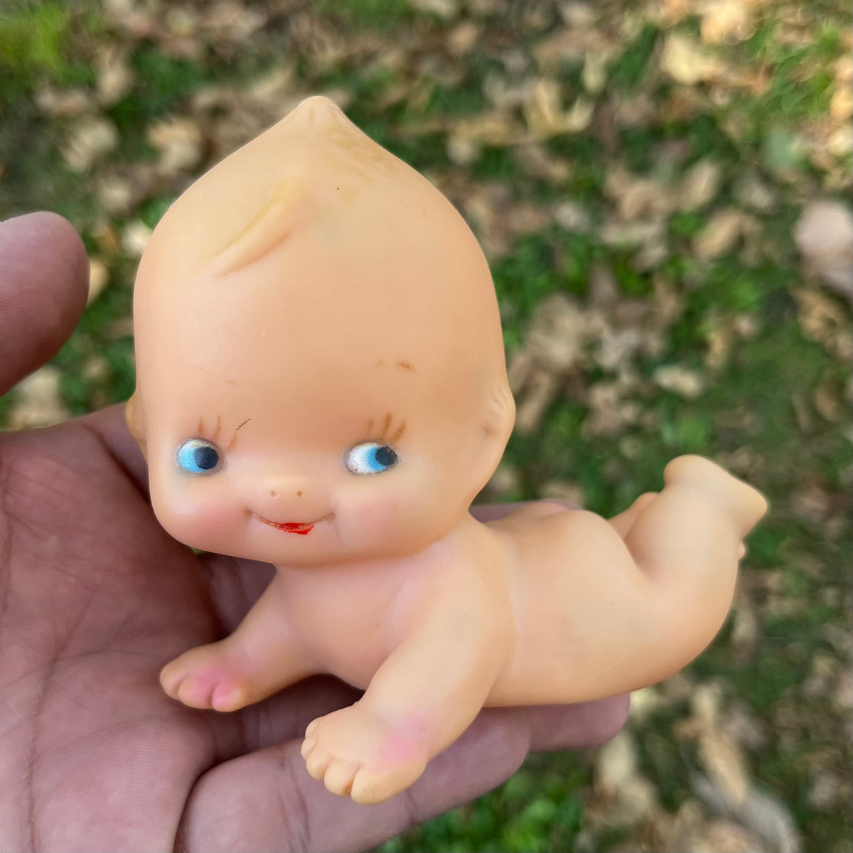 Vintage vinyl Kewpie.