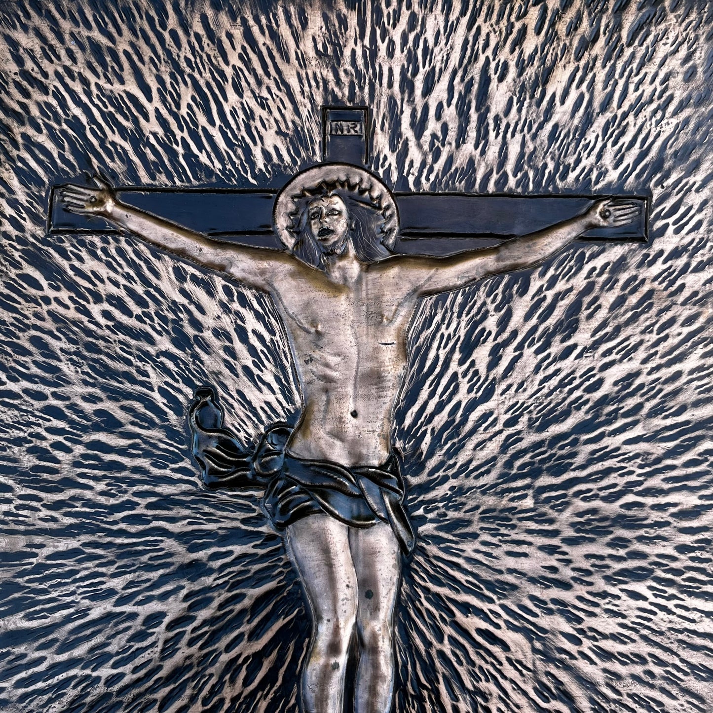 Vintage hammered copper crucifix.