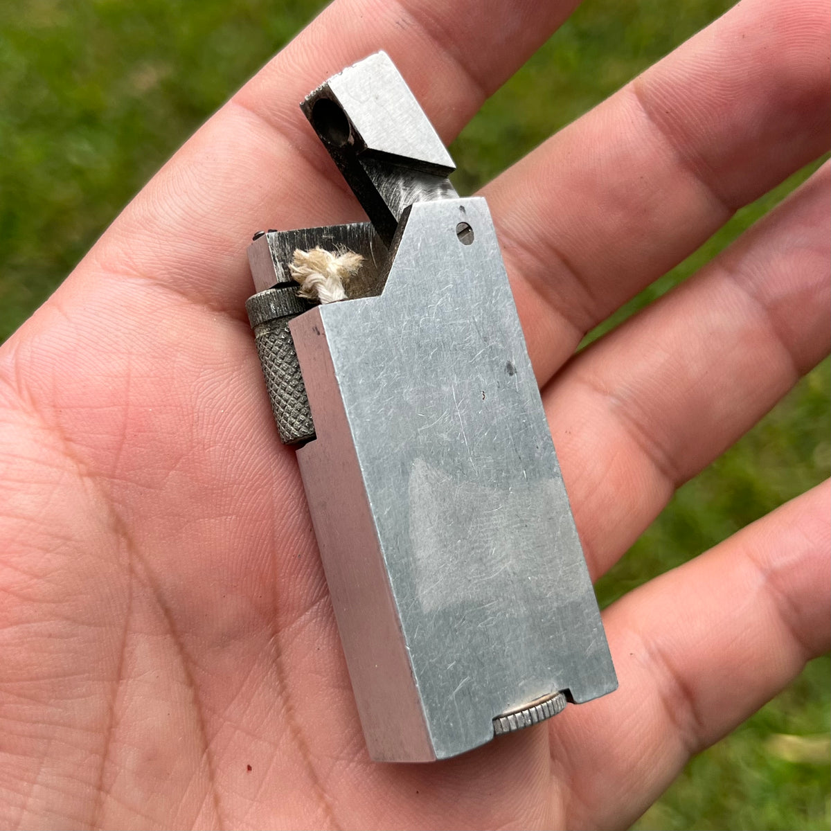 1940s Wyndham aluminum block lighter.