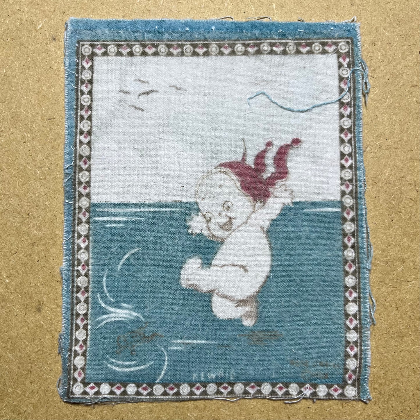 1914 Kewpie felt cloth.