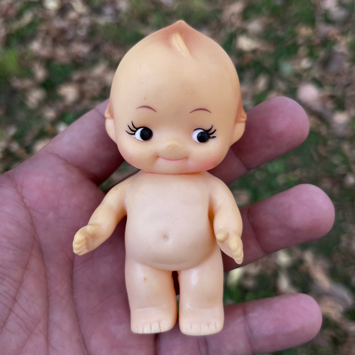 Vintage vinyl Kewpie.
