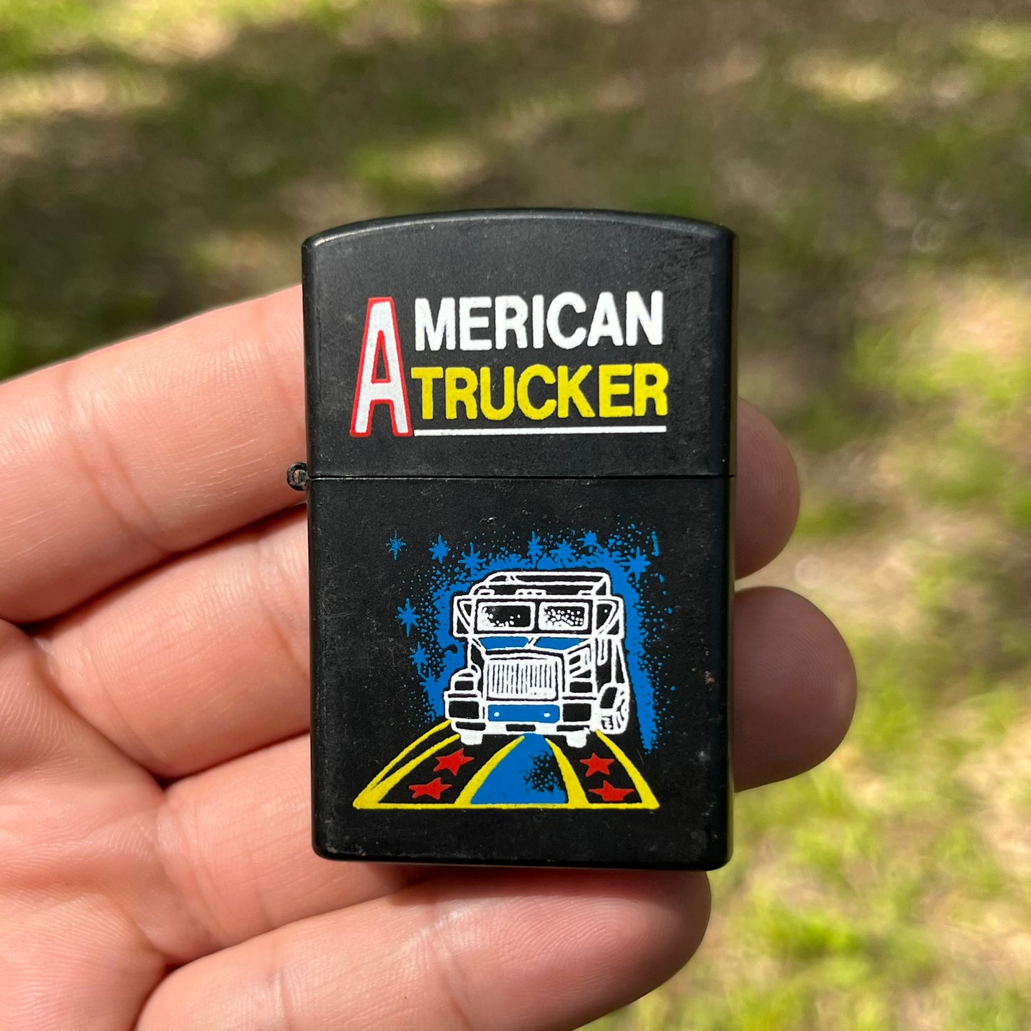 90s American Trucker flip lighter.