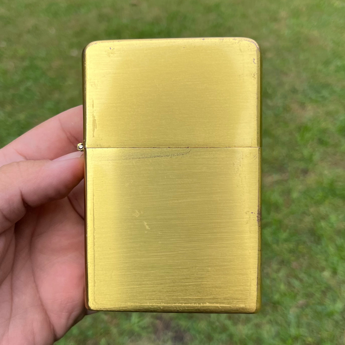 Vintage oversized flip lighter.