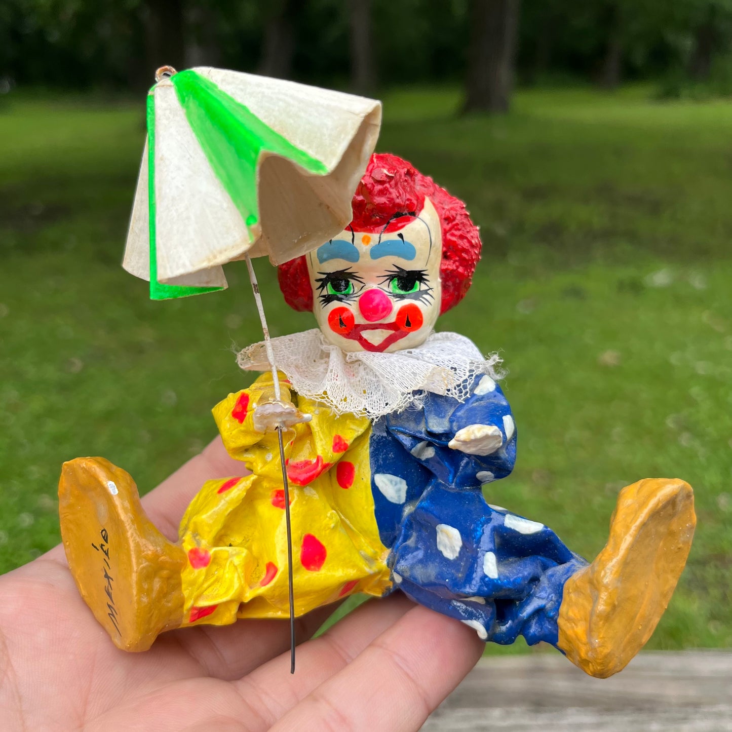 Vintage paper mache clown.
