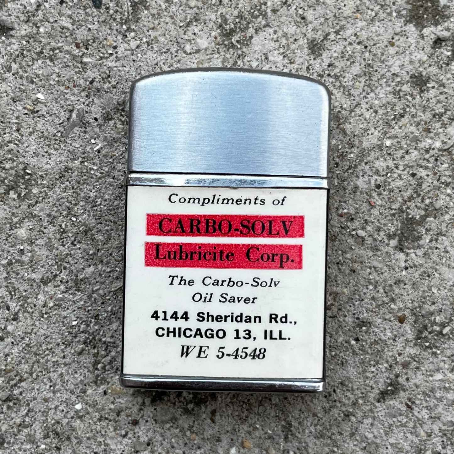 Vintage Lubricite flip lighter.