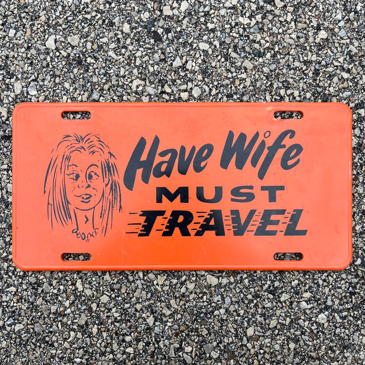 Vintage novelty license plate.