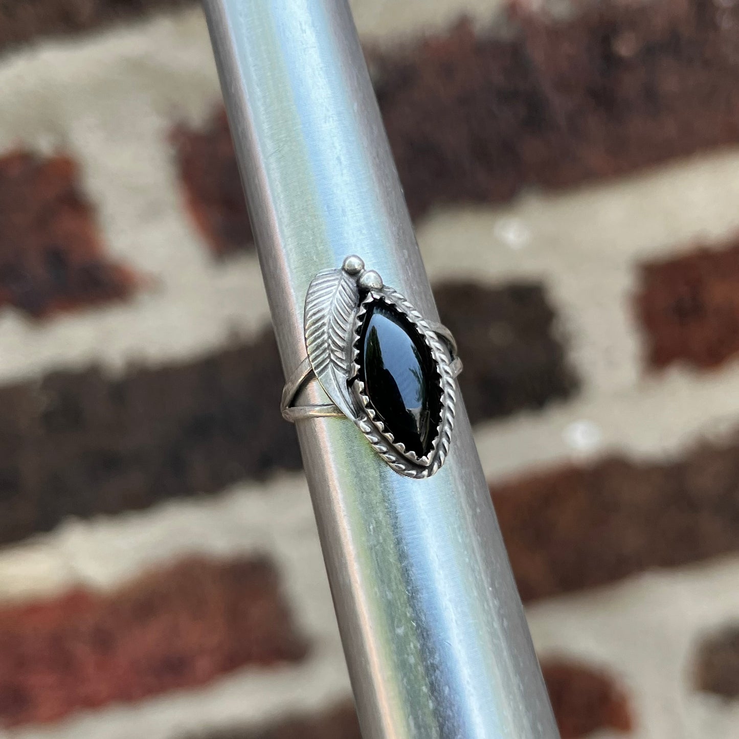 Vintage Sterling silver onyx feather ring. Size 5.25.