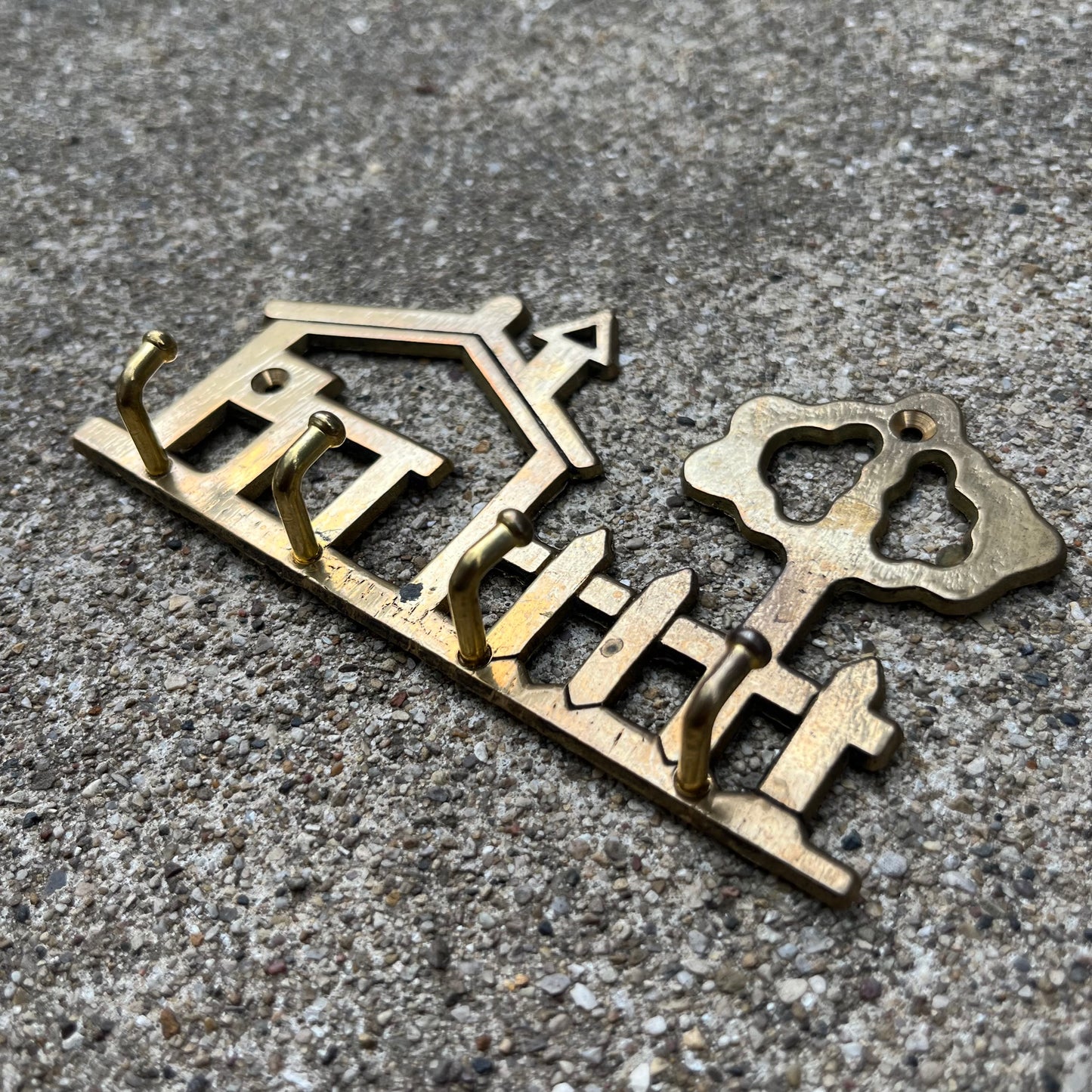 Vintage brass house key holder.
