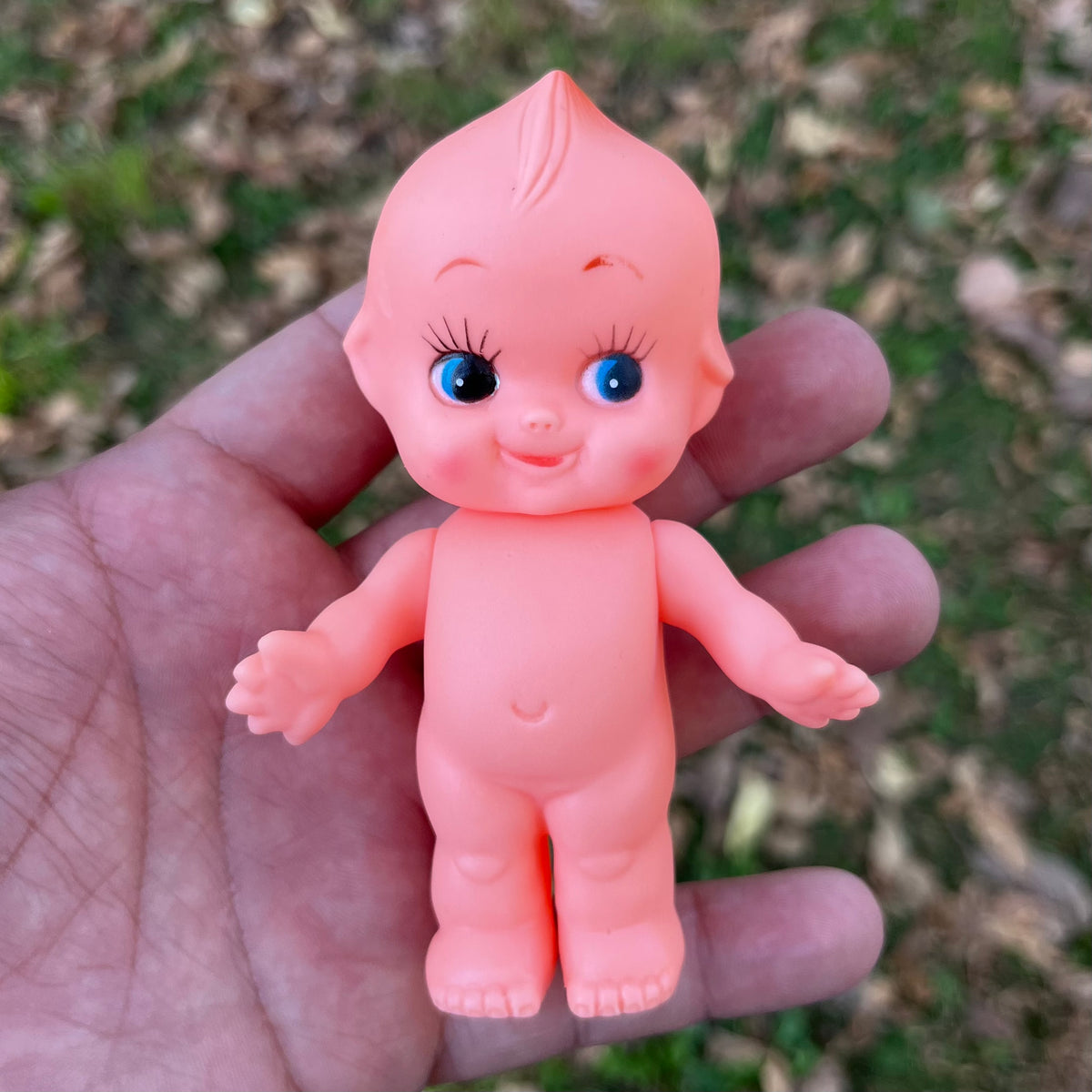 Vintage vinyl Kewpie.