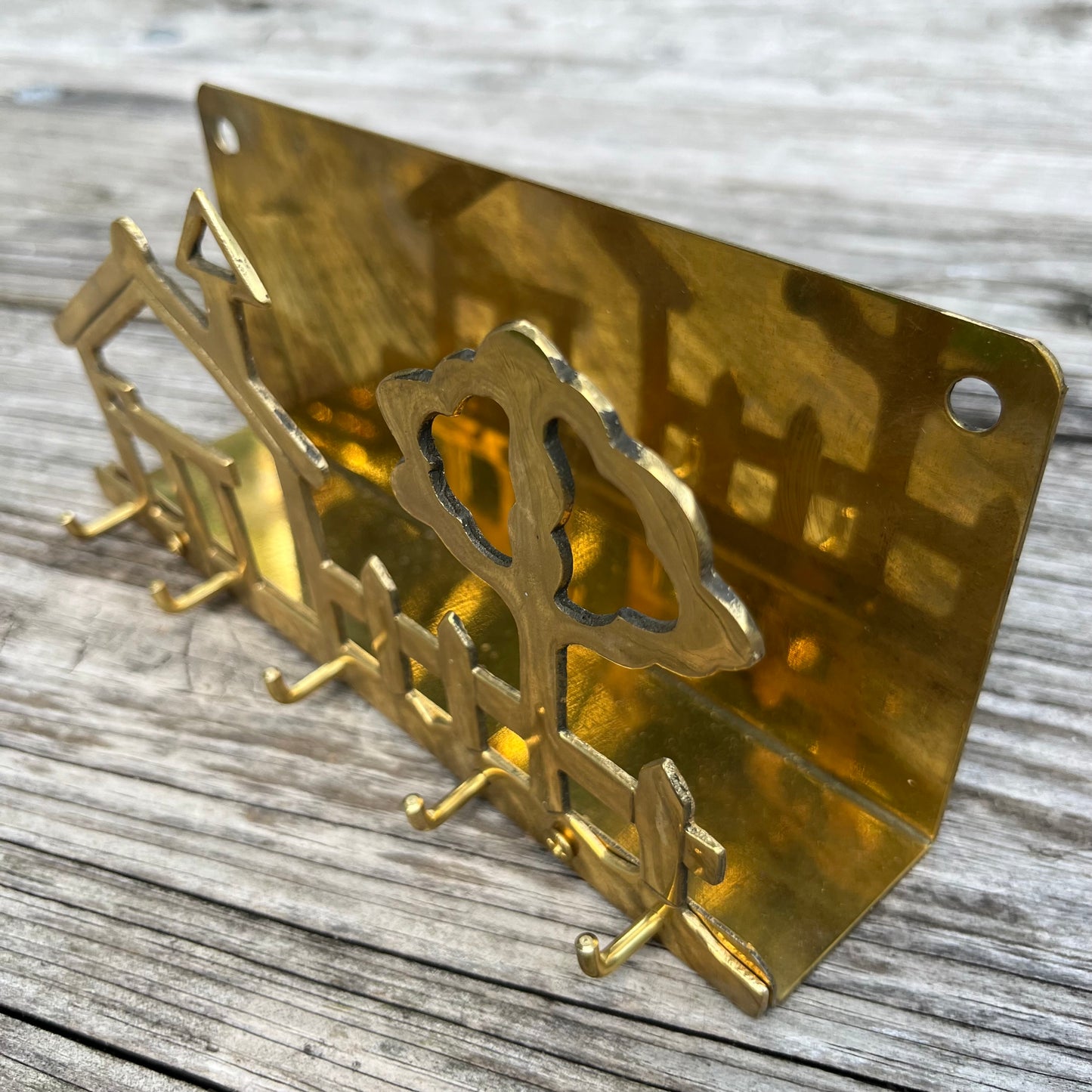 Vintage brass house key holder.