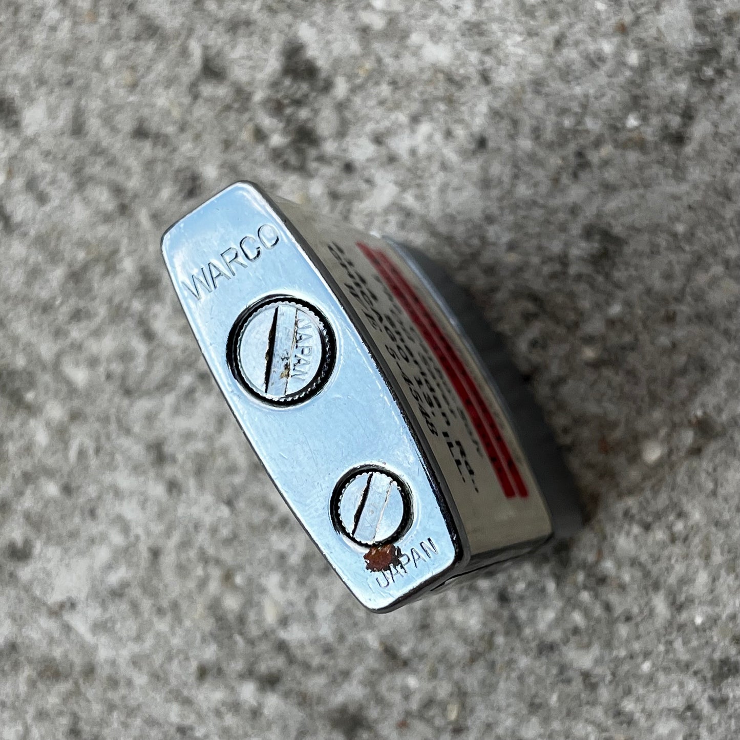 Vintage Lubricite flip lighter.