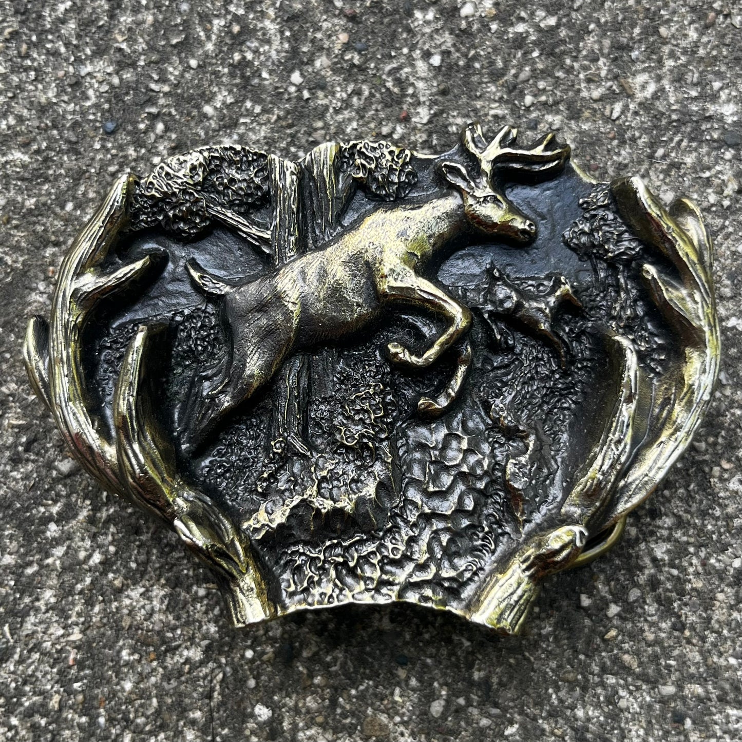 1982 Brass deer belt buckle.