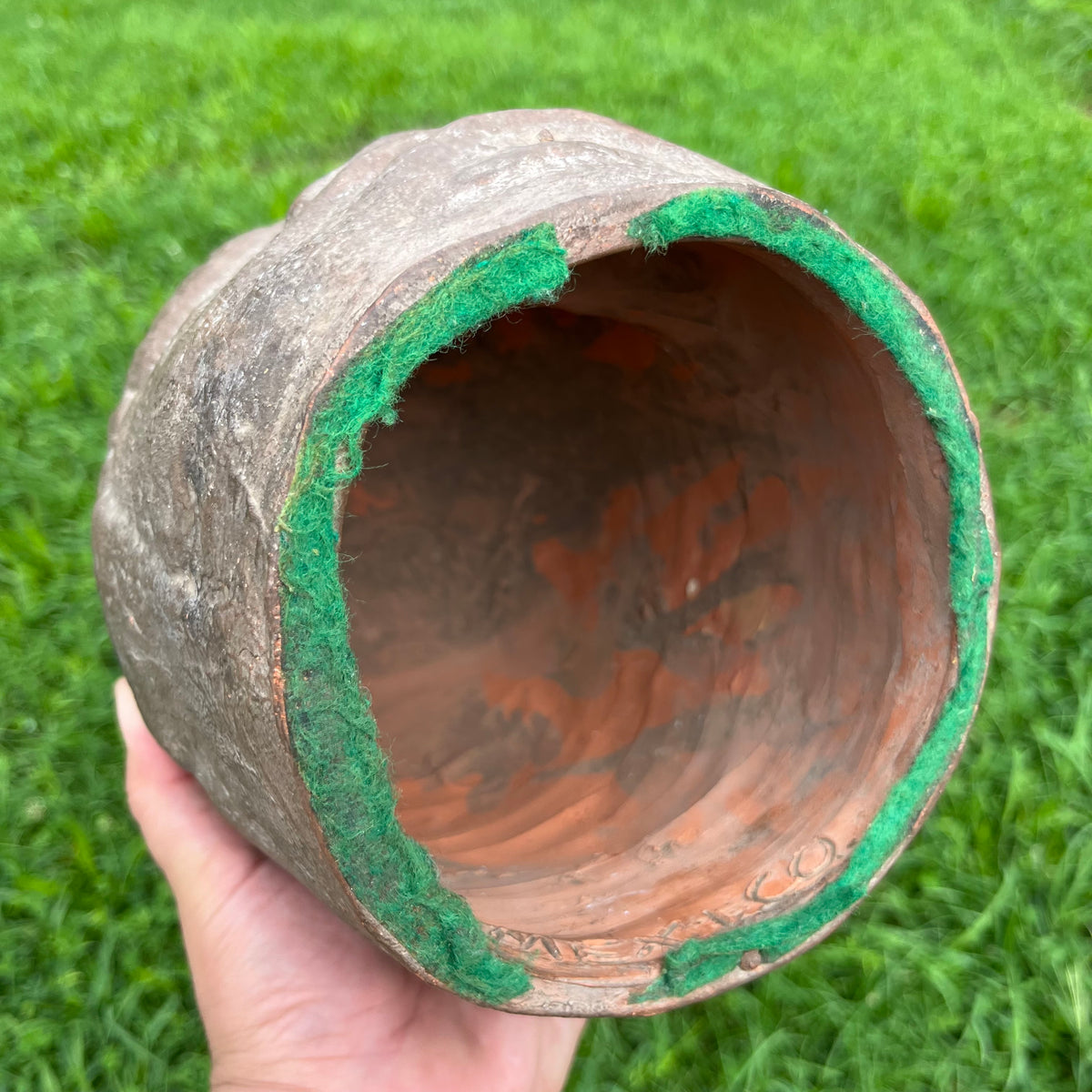 Vintage clay souvenir Olmec mask.
