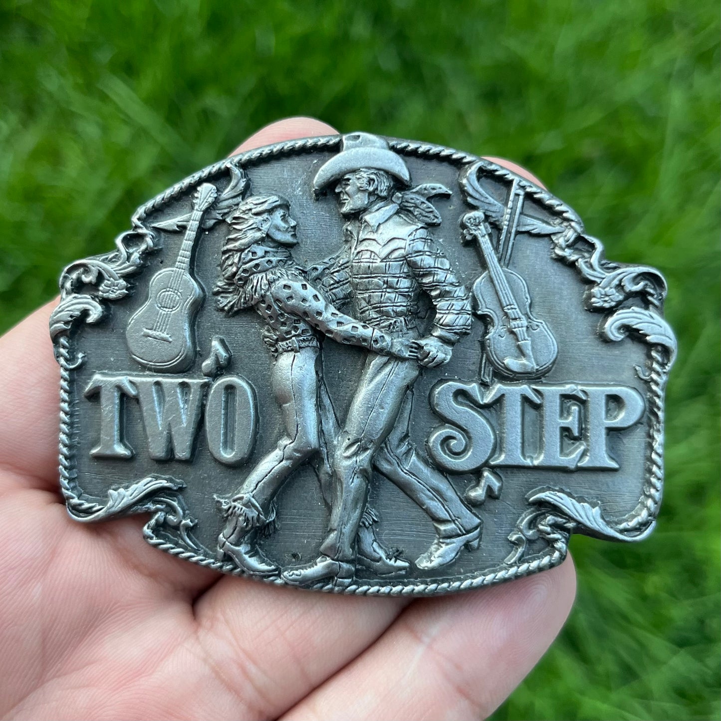 1994 Two step belt buckle.