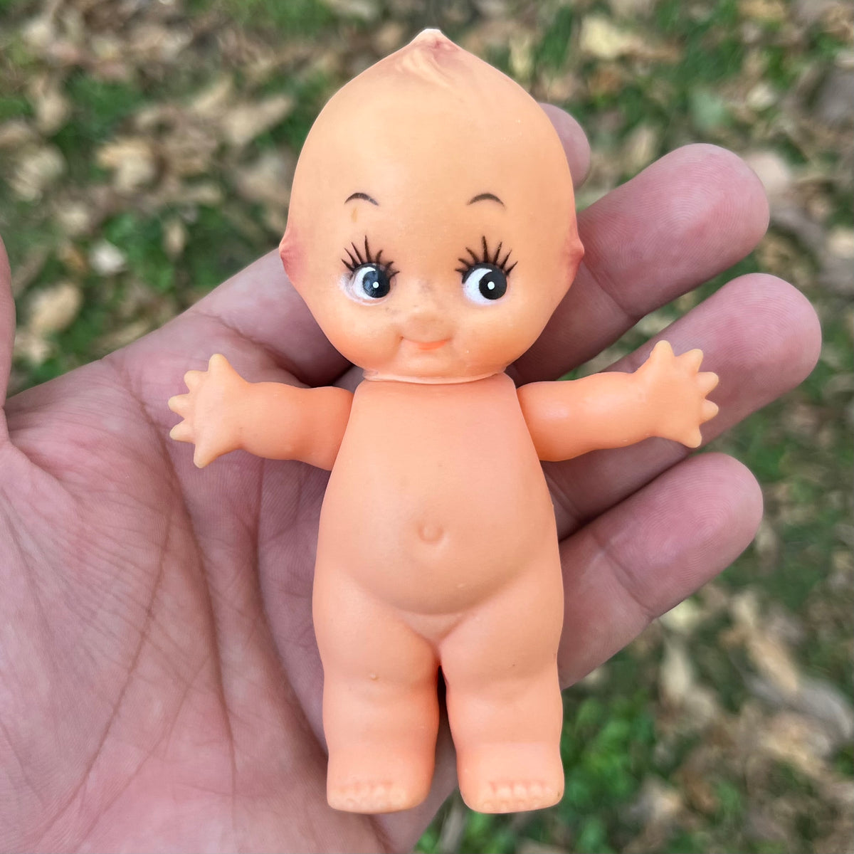 Vintage vinyl Kewpie.