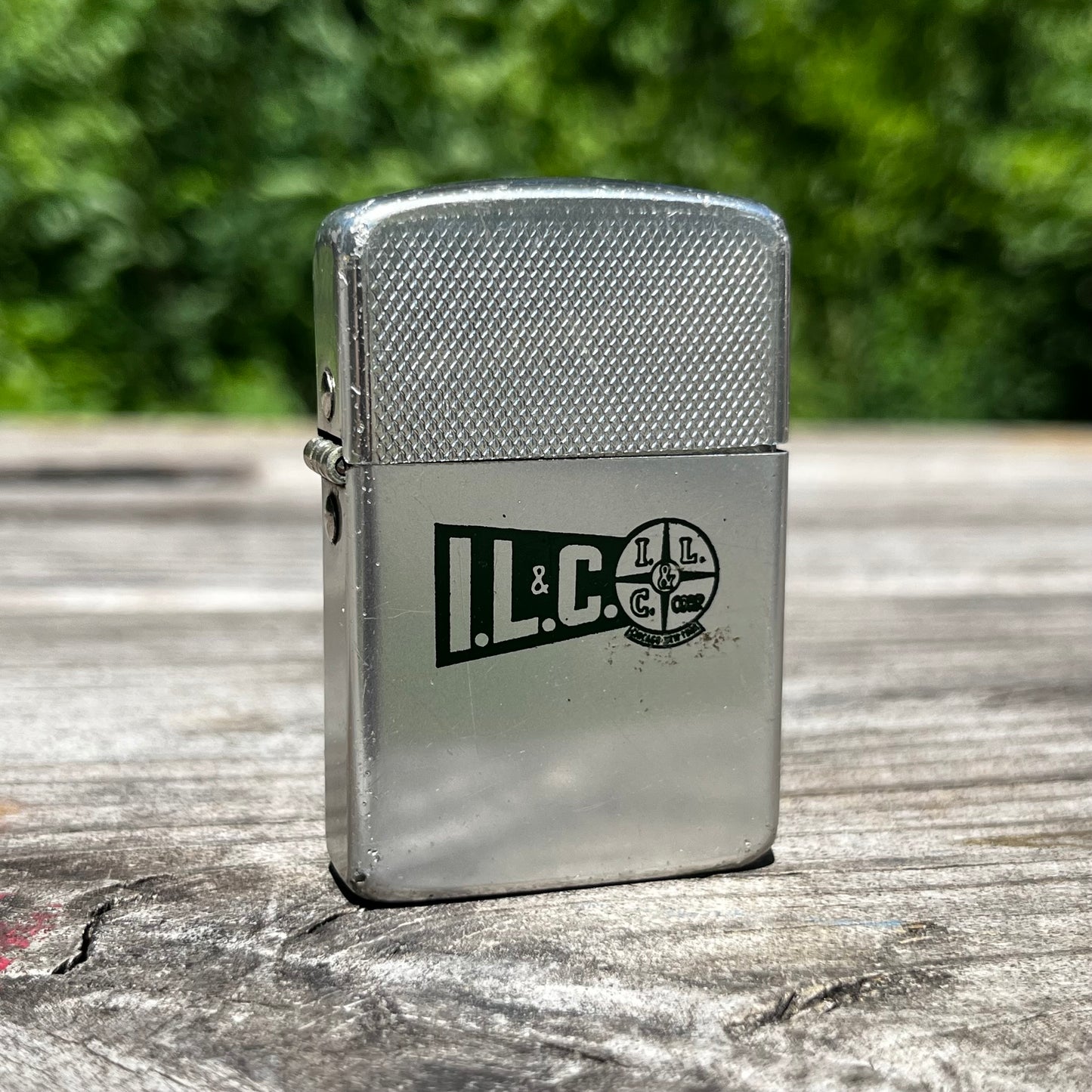 Vintage I.L.C. flip lighter.