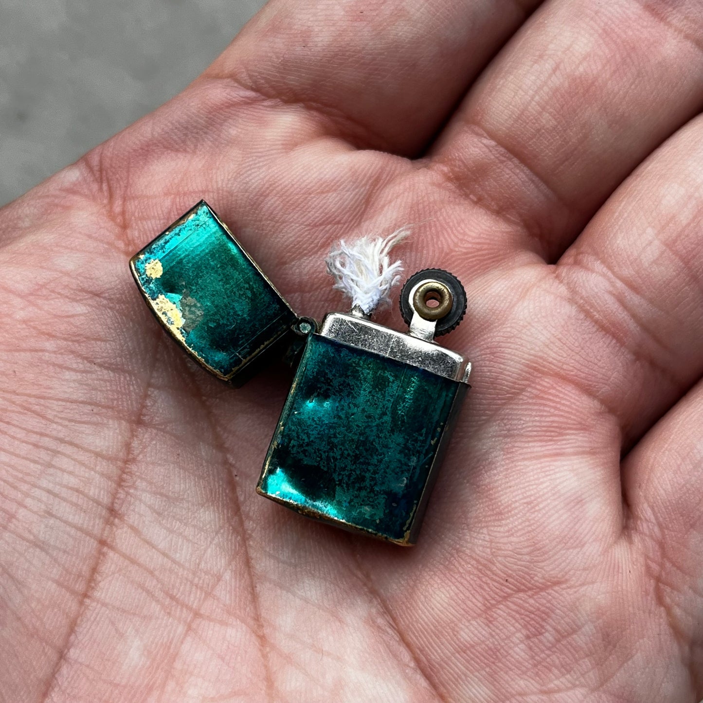 Mini 1960s flip lighter.