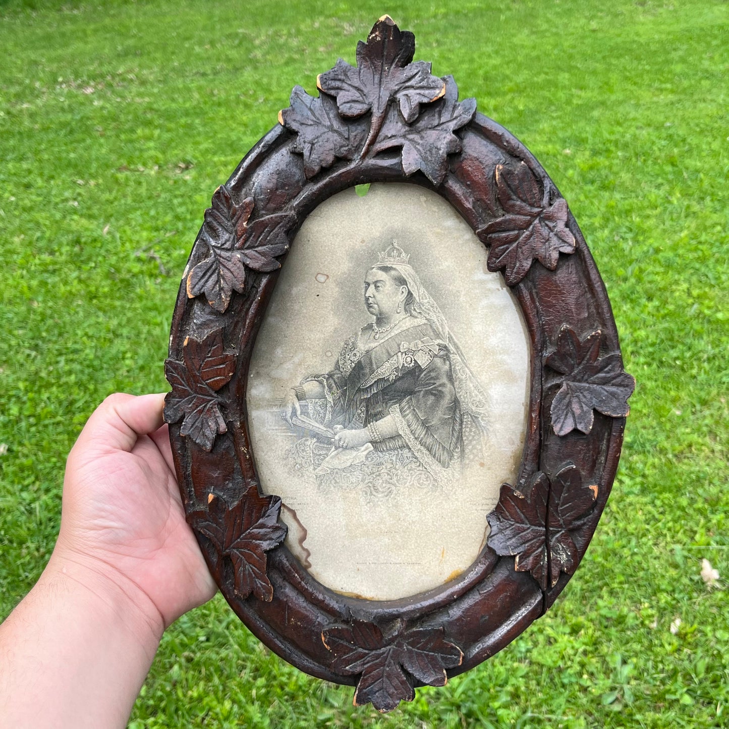 Early 1900s Hand carved frame and newspaper clipping.