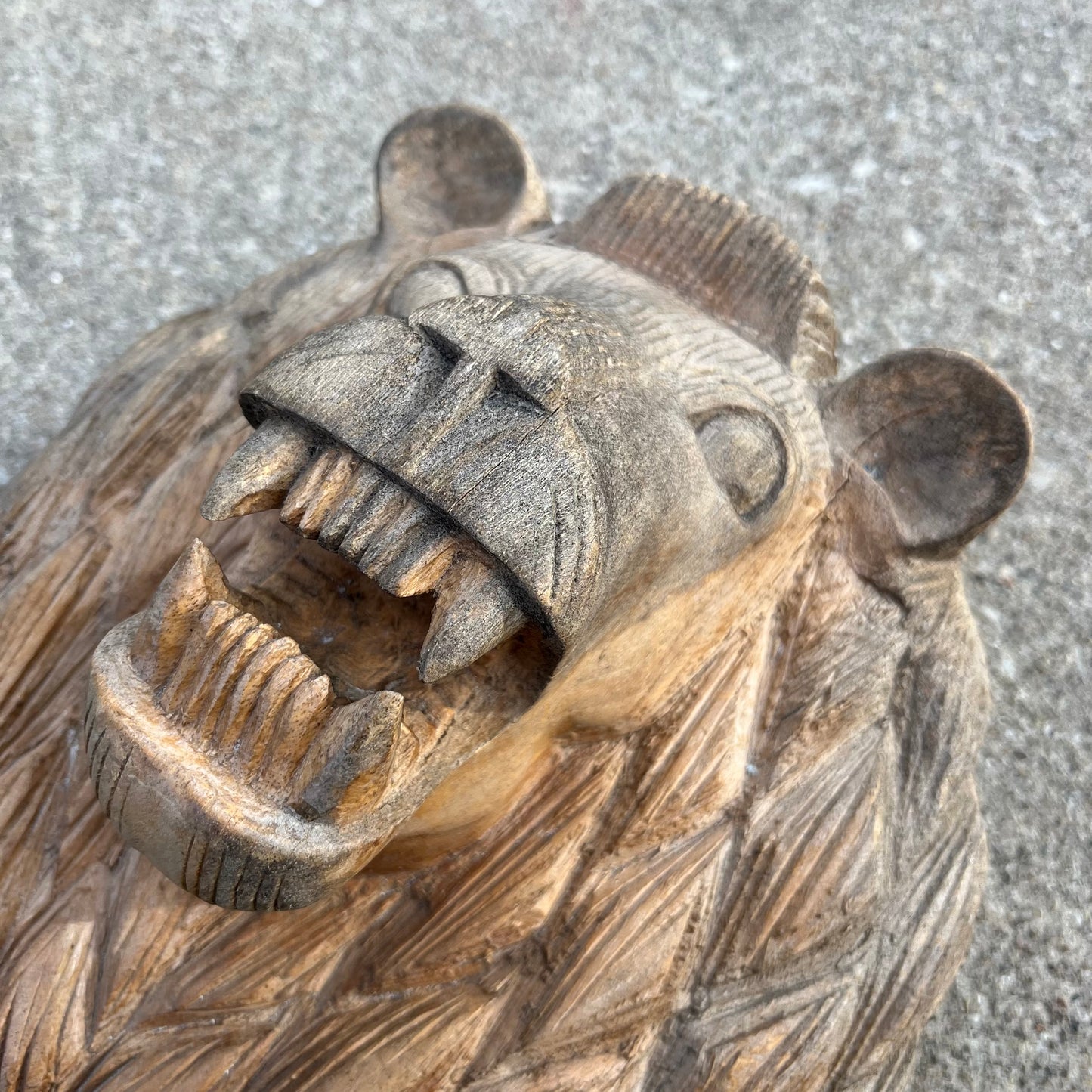 Vintage hand carved wooden growling lion.