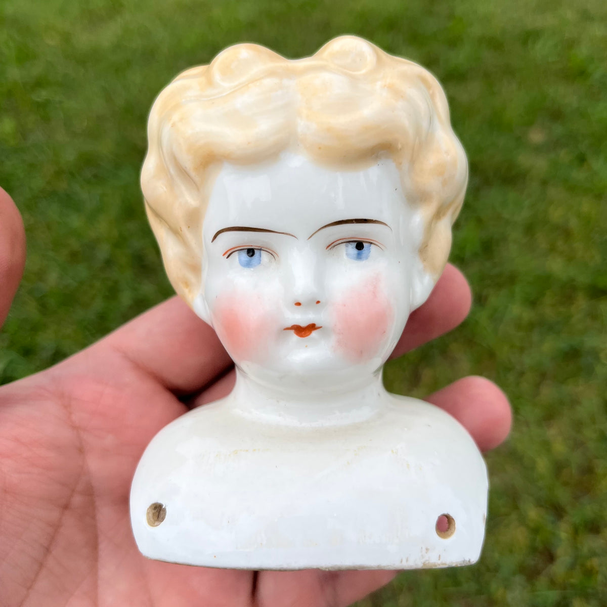 Vintage bisque doll head.