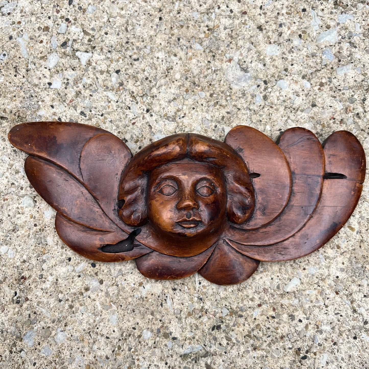 Vintage hand carved cherub.