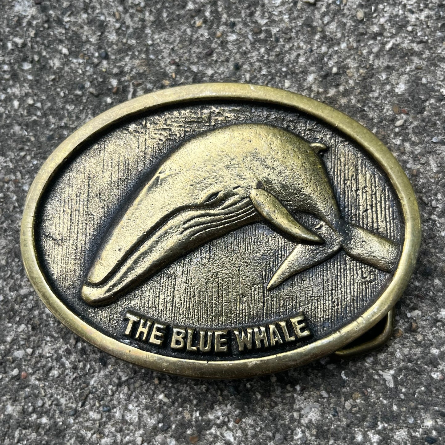 1979 General whale belt buckle.